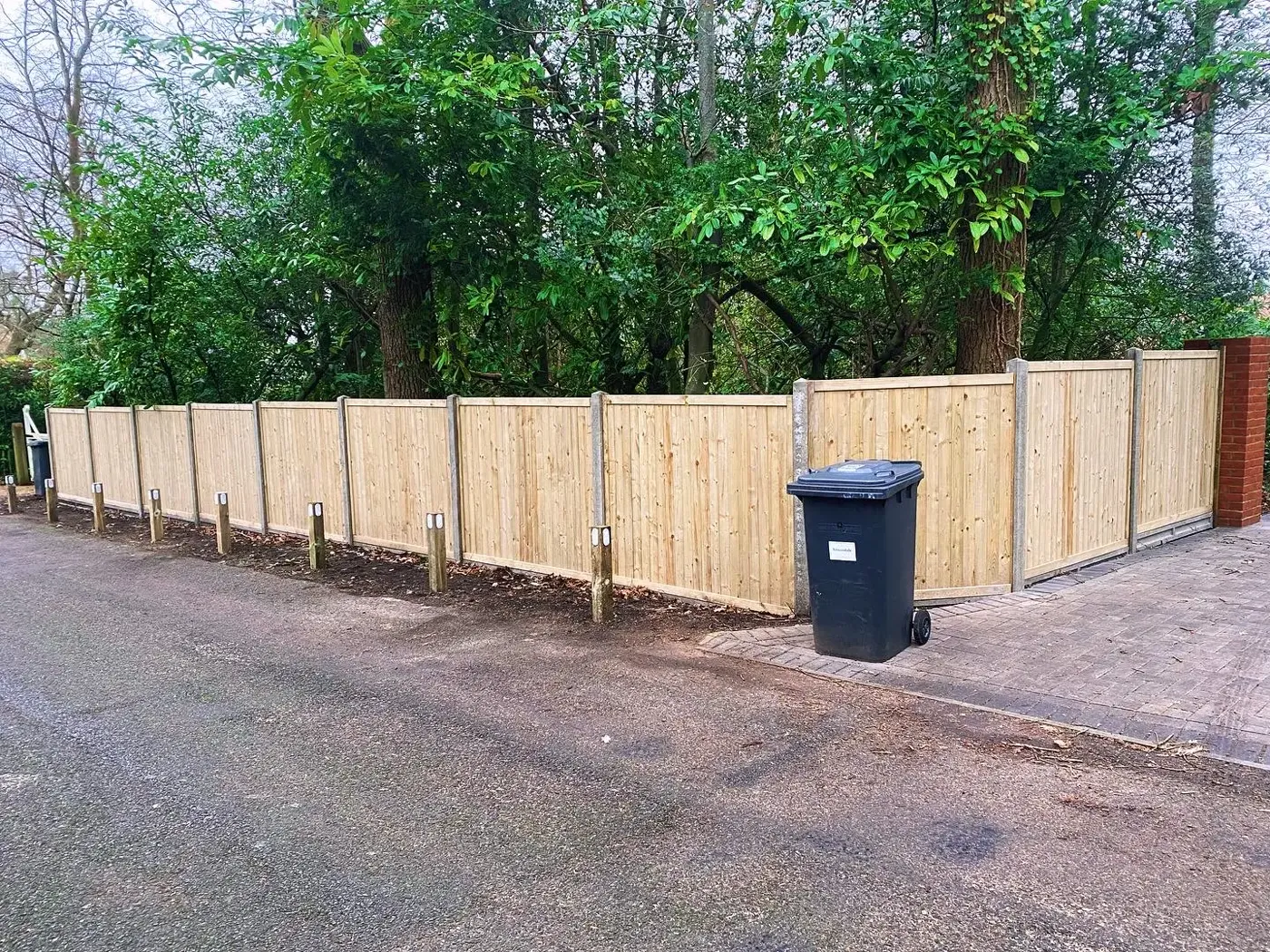 Closeboard fence installation completed in a Guildford garden