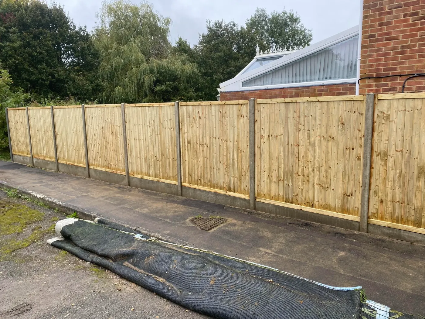 Tongue and groove fence panels fitted in Guildford